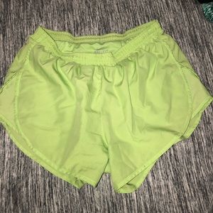 like green nike shorts